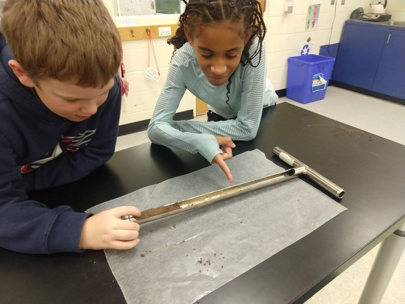 Students analyzing a soil profile
